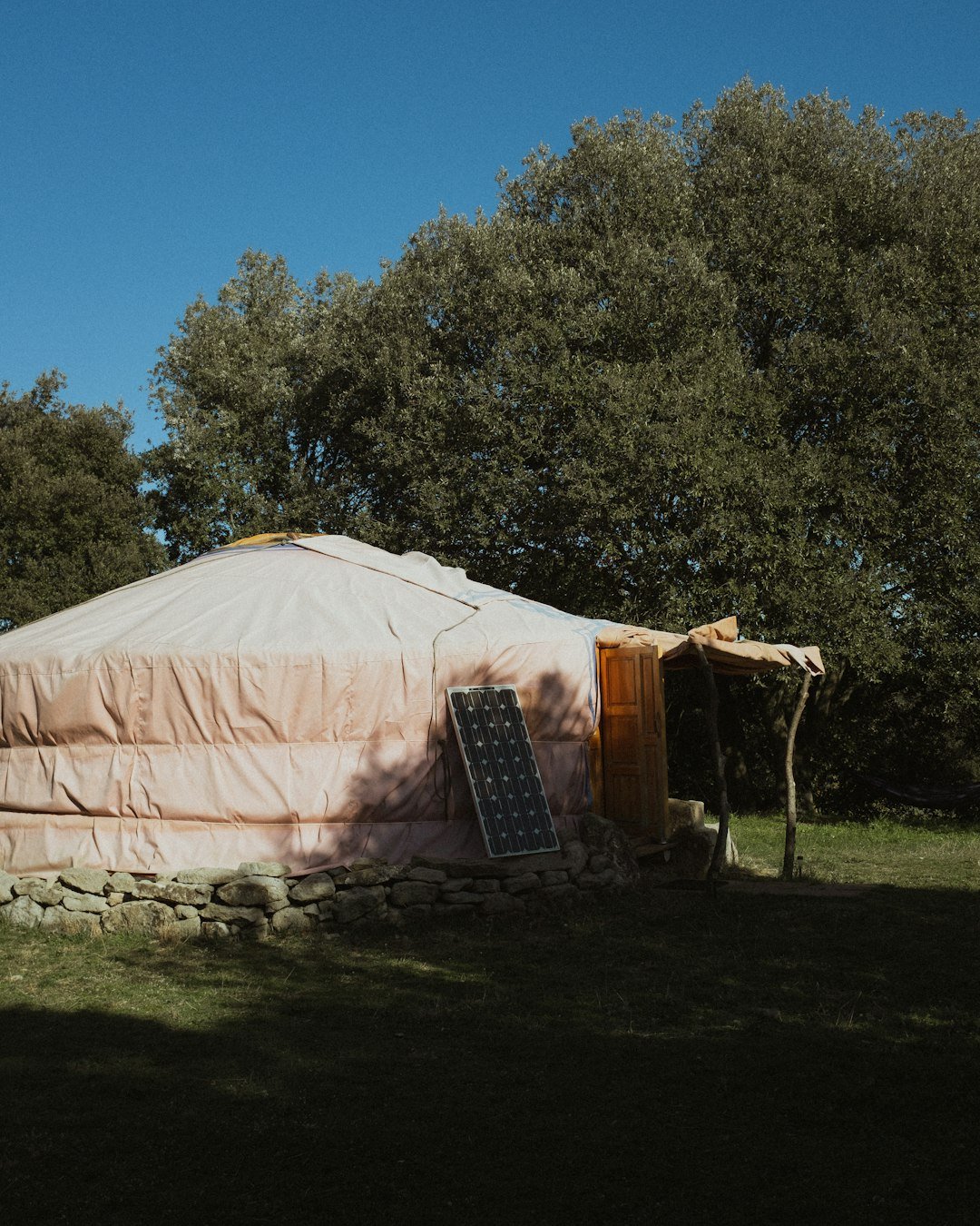 white-tent-on-green-grass-field-during-daytime-m-k3iazs4vm